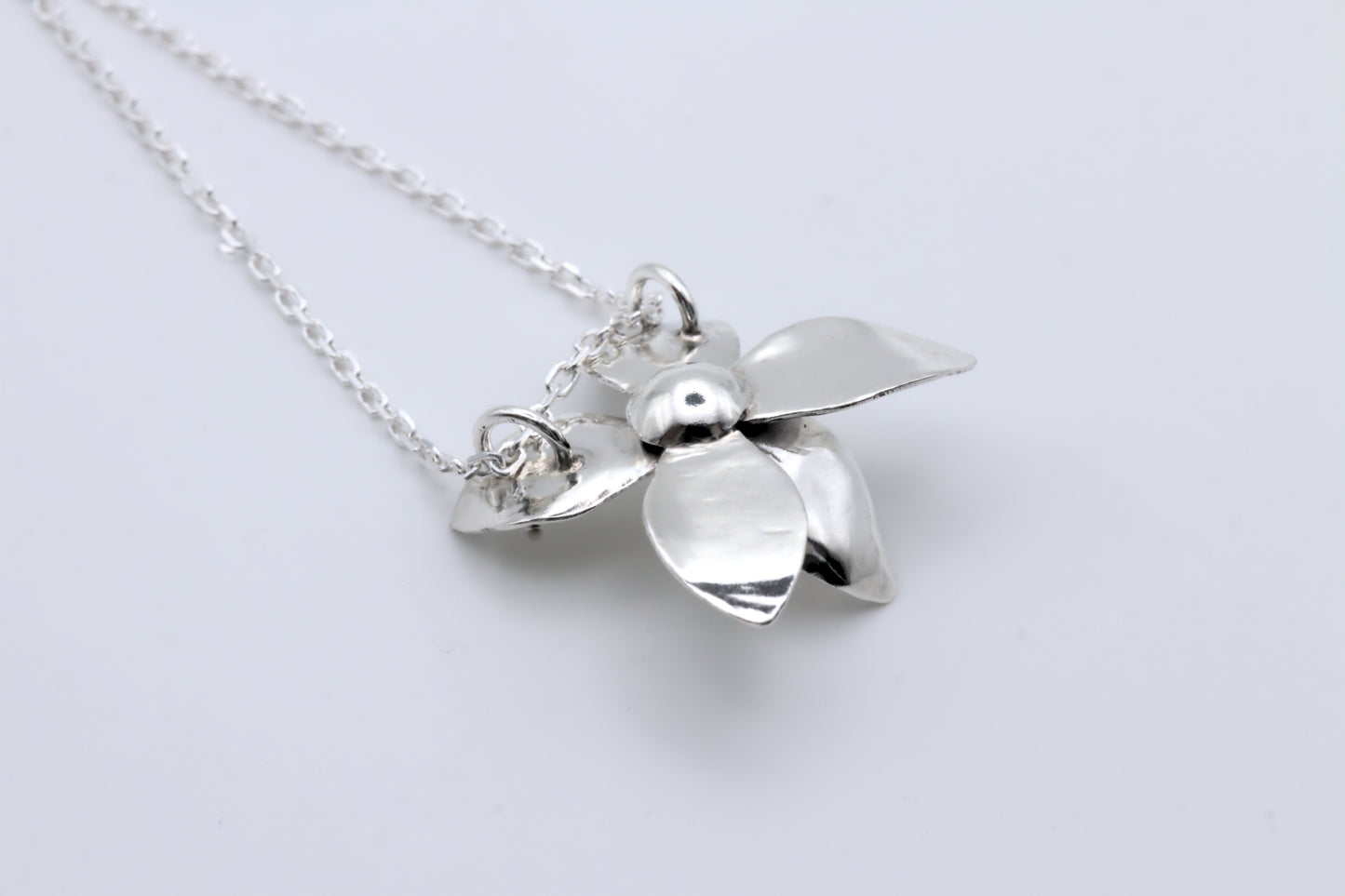 a sweet violet flower pendant in silver