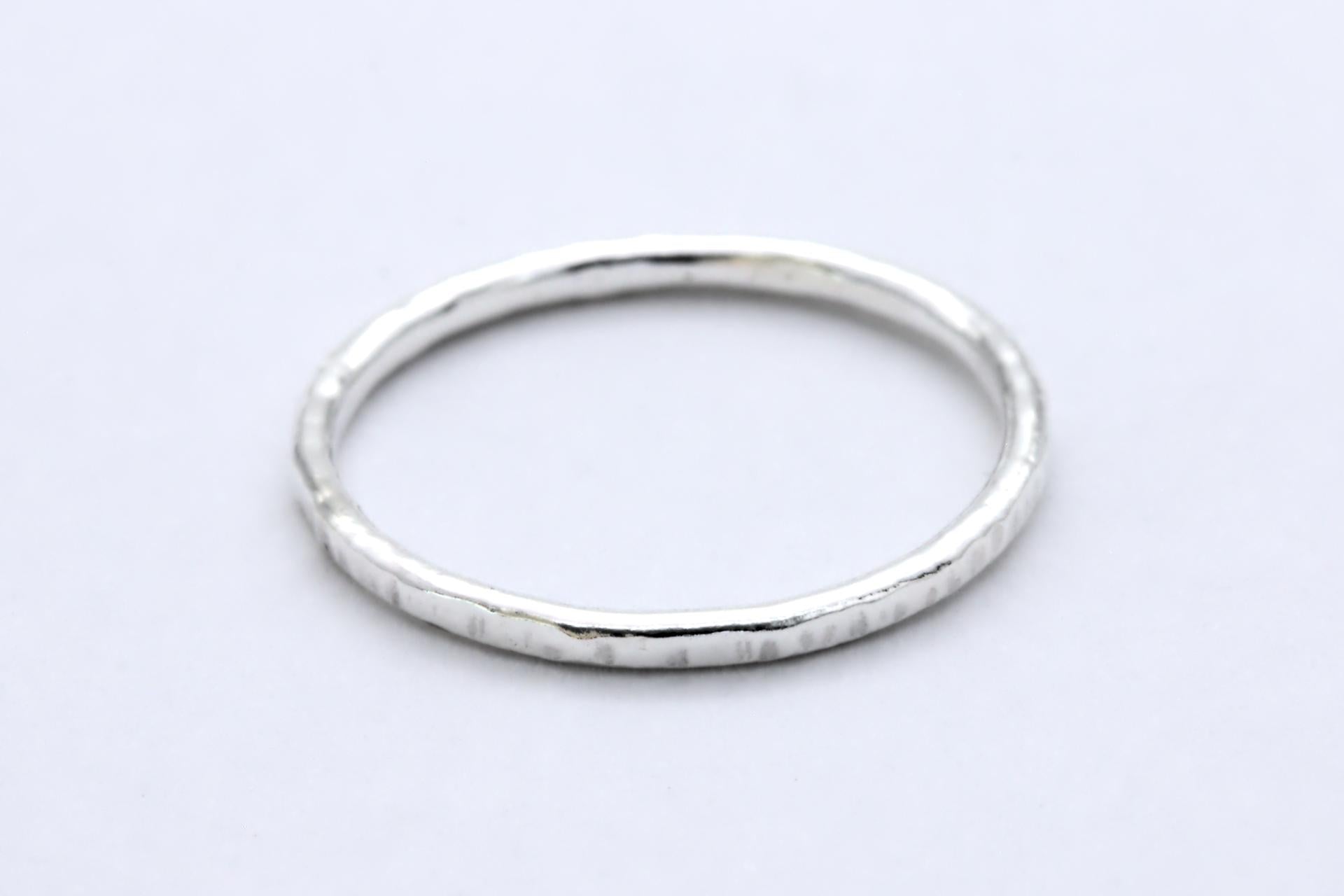 A chunky textured silver ring