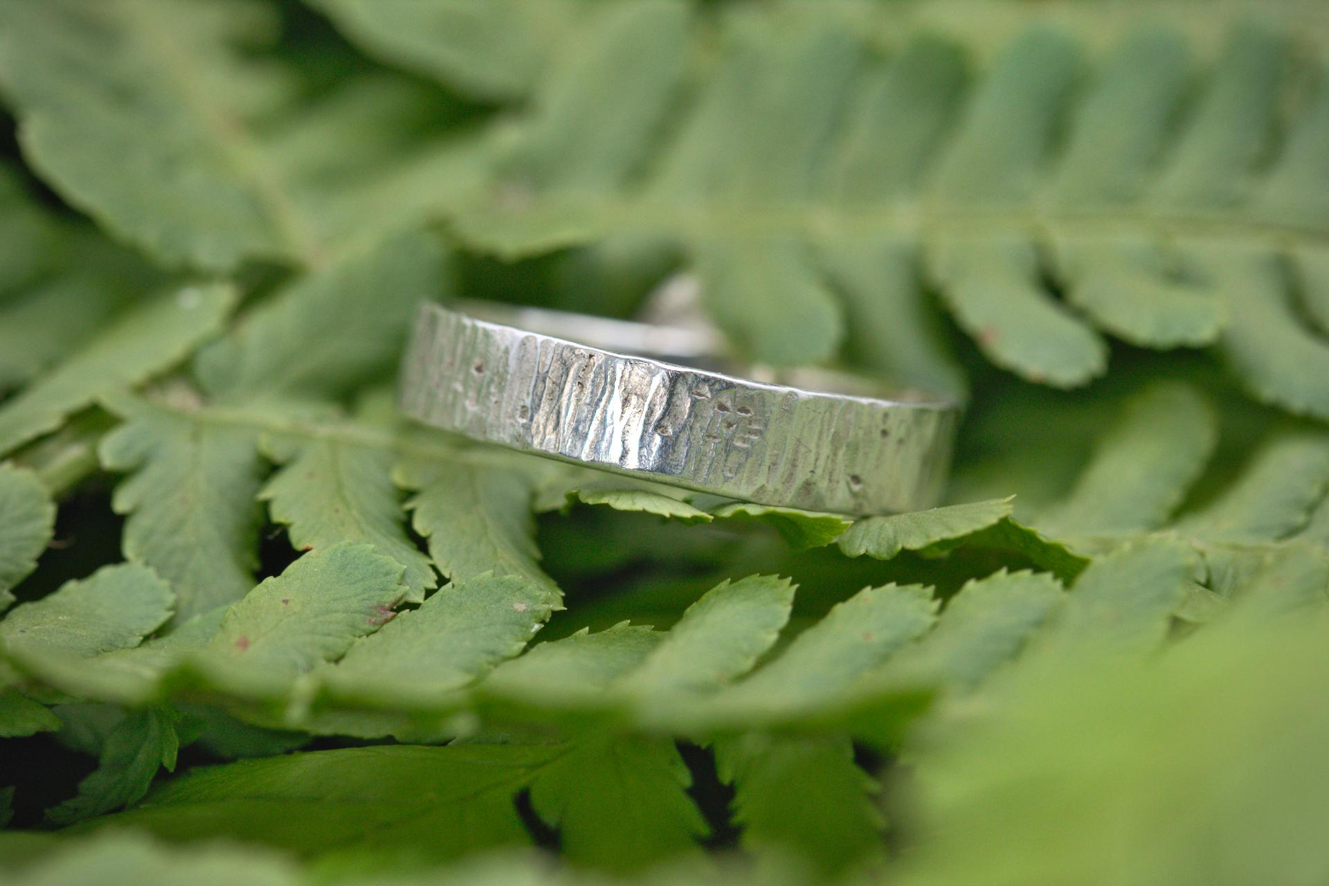 A hammered bark texture silver ring