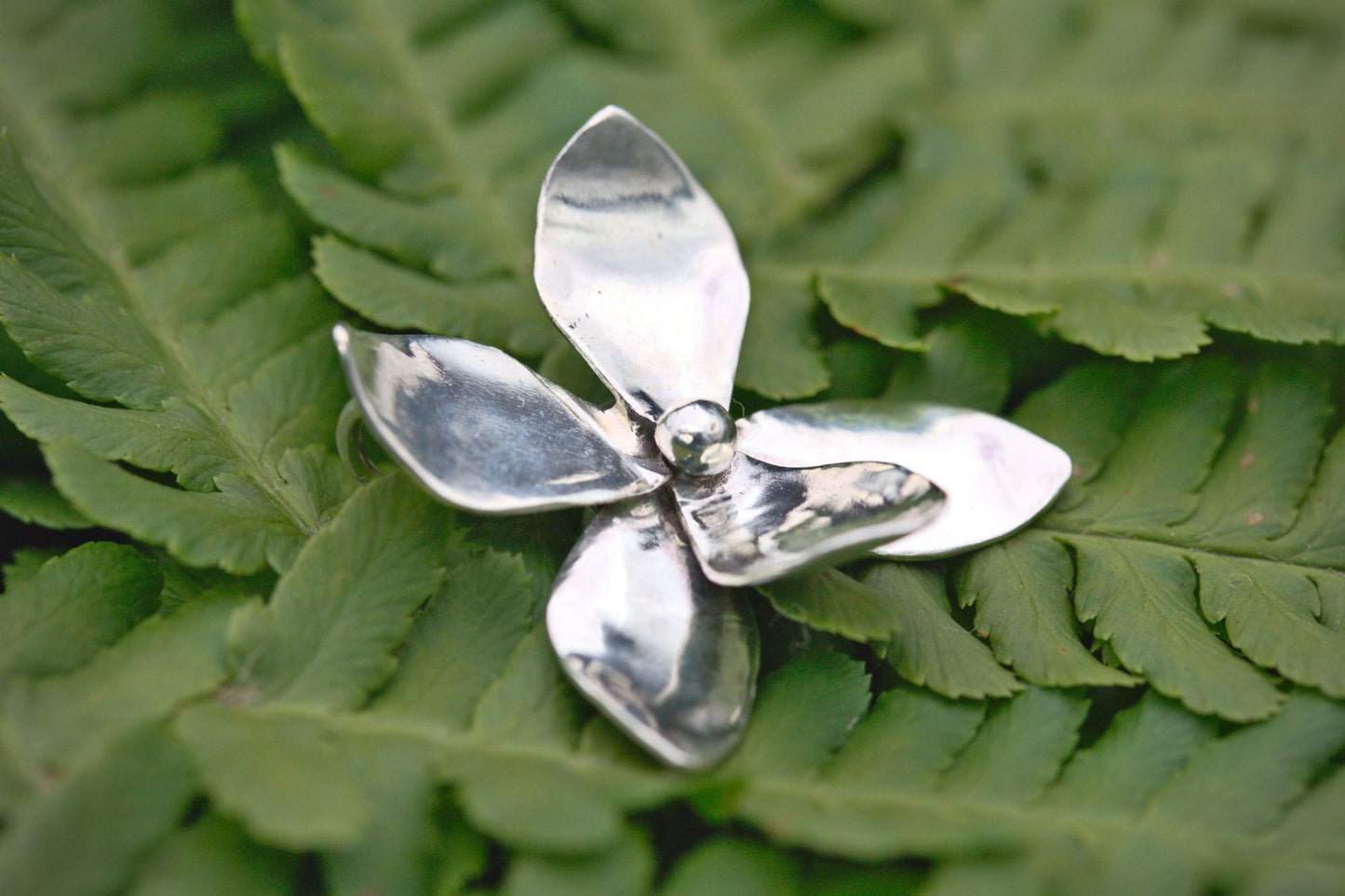 a sweet violet flower pendant in silver